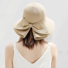 Elegant and Functional: The Perfect Summer Accessory Introducing the Women’s Summer Simple Sun Hat – your ultimate companion for sunny days. Designed with elegance and functionality in mind, this stylish hat features small eaves and a charming bow, making it perfect for beach outings, outdoor adventures, or casual strolls. Made from natural straw, this collapsible hat combines sophistication with practicality, ensuring you stay protected from the sun while looking effortlessly chic. Product Feat Elegant Beige Hat With Uv Protection, Chic Straw Hat With Bow For Vacation, Chic Vacation Straw Hat With Bow, Chic Sun Hat With Bow For Vacation, Chic Vacation Sun Hat With Bow, Summer Sun Hat With Bow For Garden Party, Spring Sun Hat With Curved Brim And Bow, Chic Sun Hat With Bow For Summer, Chic Bow Sun Hat For Summer