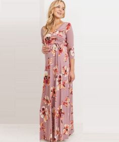 Our best-selling wrap dress is now available in the most perfect pink floral print for spring. Features high quality stretch fabric and 3/4 sleeves. Worn by pregnant, nursing, and postpartum mamas! As worn by "On Air with Ryan Seacrest" co-host, Sisanie, featured in People magazine. Color: Mauve Appearance of a wrap-dress, with out having to tie to close 95% Polyester, 5% Spandex Maternity, Postpartum & Nursing-Friendly Length measured from bustline to floor. S (0-4): Bust 33-36", Length 43" Maternity Stores, Postpartum Nursing, Ryan Seacrest, Pre Pregnancy, Nursing Friendly, Pink Floral Print, Perfect Pink, Maternity Nursing, People Magazine