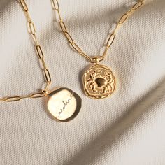 This exquisite gold wax seal necklace is a perfect blend of elegance and personalization, making it a unique accessory for any occasion. Crafted with meticulous attention to detail, this necklace features a beautifully designed wax seal pendant that can be customized with an engraving on the back. The pendant is gracefully suspended on a trendy paperclip chain, adding a modern touch to this classic piece. Key Features: Pendant Dimensions: Width: 0.98 inches, Height: 0.98 inches Necklace Length: 24 inches Material: High-quality gold Customization: Add a personalized engraving on the back of the pendant for a truly unique piece This necklace is not just an accessory, but a meaningful piece of jewelry that can carry a special message or memory close to your heart. It makes for an ideal gift f Yellow Gold Medallion Necklace With Charms As Gift, Personalized Gold Paperclip Chain Jewelry, Personalized Gold Medallion Necklace As Gift, Personalized Gold Medallion Necklace Gift, Personalized Gold Medallion Necklace For Gift, Classic Tarnish Resistant Coin Necklace For Gift, Classic Tarnish-resistant Coin Necklace For Gift, Gold Medallion Necklace With Charms As Gift, Gold-tone Medallion Charm Necklace For Gift