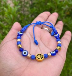 Adjustable to wrist Festival Beaded Evil Eye Bracelet, Festival Evil Eye Bracelet With Colorful Round Beads, Bohemian Evil Eye Bracelet With Round Letter Beads, Casual Beaded Evil Eye Bracelet, Bohemian Evil Eye Bracelet With Letter Beads, Bohemian Beaded Bracelets For Jewelry Making With Evil Eye, Bohemian Beaded Evil Eye Bracelets For Jewelry Making, Bohemian Evil Eye Beaded Bracelets For Jewelry Making, Adjustable Bohemian Beaded Bracelets With Evil Eye