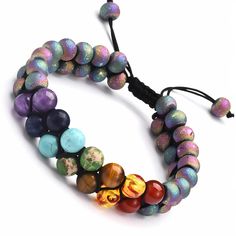 a multicolored beaded bracelet with beads