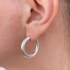 These chunky silver hoops are made of real 925 sterling silver so they will last for years to come.  Featuring a shiny silver finish, these beauties measure approximately 1 inch with a thickness of approximately 4mm. These are made with hollow tubing for a lightweight feel and have a secure latch closure. Each pair comes in a gift box.  925 Sterling silver 25mm diameter (approx 1 inch) 4mm thickness Secure latch closure Star And Moon Necklace, Thick Hoop Earrings, Moon Necklace, How To Make Notes, Shiny Silver, Silver Hoops, My Jewellery, 1 Inch, Handmade Items