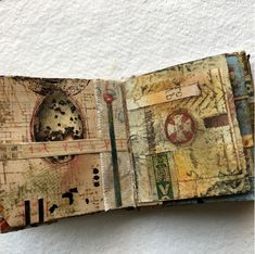 an altered book is open on the wall