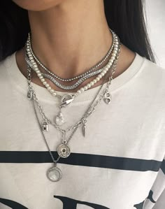 "Explore our stunning necklace collection featuring multi-layered chains with statement pearls, and modern shell pendants - the epitome of timeless elegance and contemporary style. Welcome! 📌Please Kindly Note: It is a set of five layering chain necklaces that have their own clasp, and you can buy them together or separately. 📌The first and second layers are made of stainless steel and zircon stones. 📌The third layer is made of individual glass pearl beads. The clasp is made of zamak, immerse Pearl Necklace Layering, Silver Layered Necklaces, Layering Chains, Silver Necklace Outfit, Chunky Silver Jewellery, Xoxo Jewelry, Layer Necklaces, Dope Jewelry Accessories, Necklaces Pearl