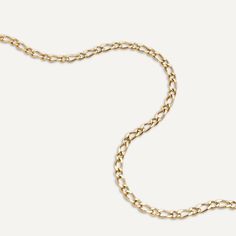 This piece features a timeless curb chain design that adds a touch of sophistication to any ensemble. Crafted from 18K gold-plated stainless steel, it is durable, water-proof, and tarnish-free. Product Code: DN2681K Collection: Vibes Type: Clasp Material: 18K Gold-Plated Stainless Steel Dimensions: Length 40-44cm Pendant Dimensions: Style: Classic Includes: Curb Chain Necklace, Free Product, Chain Design, Goodie Bags, Curb Chain, Water Proof, Style Classic, Earring Necklace, Ring Necklace