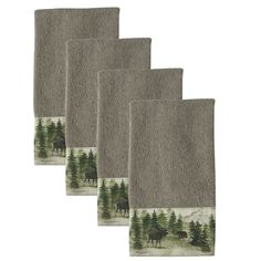 four towels with trees and animals on them