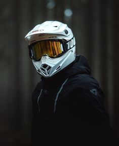 a person wearing a white helmet and goggles