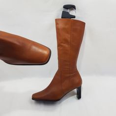 Introducing vintage brown boots with a low heel. These women's knee-length boots with square toe are comfortable and practical. For narrow to medium foot. Thanks to the elastic at the top, it fits the shin well. The retro style, will emphasize the beauty of your legs. They are made of genuine leather and fit well around the shank. Made in Italy. The fashion of the 90's - 00's offers you an iconic look that will stand the test of time. In good condition. On request I can send additional photos. M Brown Leather Mid-calf High Boots, Brown Knee-high Heeled Boots, Brown Tall Knee-high Heeled Boots, Fitted Knee-high Boots With Almond Toe For Winter, Fitted Almond Toe Knee-high Boots For Winter, Tall Brown Knee-high Boots, Fitted Almond Toe Mid-calf Winter Boots, Brown Wide Calf Knee-high Boots, Fitted Brown Boots With Low Heel