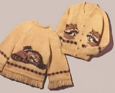 two knitted sweaters with animals on them, one is yellow and the other is brown