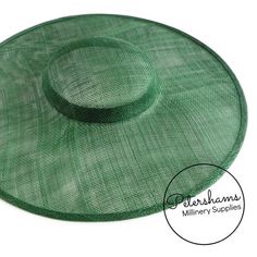 This bottle green cartwheel hat base is a classic shape that has sprung into popularity in the past year. Made from 2 layers of stiffened sinamay, these cartwheels are ready to trim and are fitted with a petersham ribbon on the inside crown edge. Simply add a comb or headband to secure to the head.Hat base measures:Width: 35.5cm (14 inches)Crown Width: 13.5cm (5.3 inches)Crown Height: Approximately 3.5cm (1.7 inches)For even more millinery supplies you can find us here:www.etsy.com/shop/Petersha Adjustable Green Hat Bands For Kentucky Derby, Green Adjustable Hat Bands For Kentucky Derby, Adjustable Green Hat Band For Kentucky Derby, Green Brimmed Straw Hat, Green Wide Brim Fascinator For Kentucky Derby, Green Brimmed Sun Hat For Kentucky Derby, Green Wide Brim Fascinator For Garden Party, Green Short Brim Sun Hat For Kentucky Derby, Fitted Green Top Hat For Church