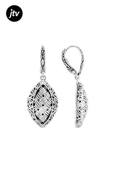 Elevate your style with these exquisite Sterling Silver Woven Dangle Earrings from our Artisan Collection of Bali���. Crafted using the intricate Oxidized Finishing Technique, each piece showcases a unique blend of elegance and artistry. The delicate design measures 1.58 inches in length and 0.59 inches in width, making them an ideal statement accessory for any occasion.  These stunning earrings feature a secure lever back closure type that ensures they stay comfortably on your ears all day long Delicate Design, Stunning Earrings, Bali, Dangle Earrings, Sterling Silver, Silver, Design