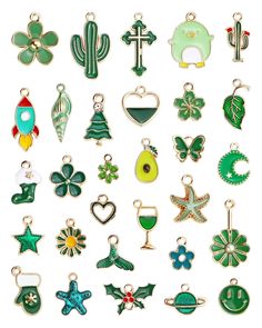 many different types of charms on a white background