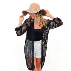 Slip into something classy this summer for all your beach plans with our new Coastal Views Crochet Tie Kimono! Lightweight yet still oh-so-cozy, this kimono is made with a soft crochet fabric and closes at the waist with a tie closure. And with the tie being removable, you can even style this kimono over your favorite dress or denim shorts! Available in white and black Measurements: Arms 9" / Length 35.5" / Width 17" + stretch Spring Beach Party Cover-up With Crochet Trim, Bohemian Knit Cover-up For Beach Season, Spring Crochet Lace Beachwear Cover-up, Lightweight Cover-up For Beach Season, Chic Beach Season Cover-up For Warm Weather, Spring Beachwear Crochet Top With Crochet Trim, Lightweight Open Front Beach Cover-up, Spring Crochet Trim Beachwear Top, Lightweight Summer Cover-up With Open Front