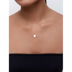 14kt Mother of Pearl Diamond Dot Coin Necklace When we think of an everyday necklace, this is it. A lustrous mother of pearl disc is set in a coin case and set with a bezeled diamond. Hangs magnificently from a 16" diamond cut chain with sparkles. This necklace is adjustable as it comes with a 2"in extension as well. Adore! 14kt Yellow Gold 2.50gm Gold 10mm Mother of Pearl 0.02ct Diamonds 16" + 2" ext Chain Lobster Lock 14k Gold Pearl Necklace With Round Pendant, Elegant Coin Necklace With Pearl Pendant, Elegant Sterling Silver Round Disc Coin Necklace, Elegant Medallion Coin Necklace For Anniversary, Elegant White Round Disc Jewelry, Elegant White Round Coin Necklace, Elegant Pearl Necklace With Coin Pendant, Elegant White Coin Necklace With Round Pendant, Elegant Round Coin Necklace For Anniversary