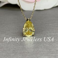 Pear shape pendant with yellow diamond, and 18 inch yellow gold chain #5697 #GiftForHer #GoldNecklace #14kYellowGold #HolidayGiftIdea #SimulatedDiamond #BirthdayGift #YellowPear #WeddingJewelry #DiamondNecklace #MothersDay Classic Pear-shaped Drop Necklace For Anniversary, Gold Solitaire Necklace With Brilliant Cut Teardrop Pendant, Gold Teardrop Pendant Solitaire Necklace With Brilliant Cut, Gold Brilliant Cut Teardrop Pendant Necklace, Yellow Gold Gemstone Drop Necklace For Anniversary, Classic Teardrop Solitaire Necklace In Yellow Gold, Classic Yellow Gold Teardrop Solitaire Necklace, Gold Teardrop Pendant Solitaire Necklace For Anniversary, Pear-shaped Gemstone Drop Necklace For Anniversary