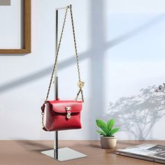 【5 X 5 X 27" L-Shaped Purse Display】 This handbag display rack is made of stainless steel with a polished finish. The L-shaped hook fits any handbag handle without scratching the leather surface, keeping the handbag securely in place without falling off easily. The EVA base ensures stability and prevents slipping, ensuring safe use.【15-27" Adjustable Height】 The base dimensions of this handbag display rack are 5.91 X 5.12 inches (15CM X 13CM) with a thickness of 0.25mm. The height can be adjuste Displaying Purses, Purse Display, Handbag Display, Handbag Holder, Handbag Boutique, Accessories Elegant, Hat Display, Storage Closet Organization, Handbag Handles