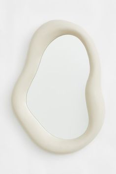 Asymmetric mirror in a frame made from paper and medium-density fiberboard. Hole at back for hanging. Screws not included. Width approx. 11 1/2 in. Height approx. 16 in. Large Irregular Mirror, Wave Mirror Aesthetic, Asymmetric Mirror, Wavy Mirror, Beige Art, Mirror Light, Hallway Decor, H&m Home, Courtyard House