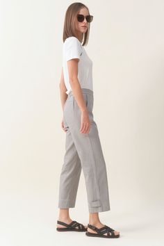 Cool, comfortable, convertible – our unique pant ticks all the boxes for effortless, trans-seasonal style. This relaxed fit has clever snaps at the hem that easily transform the pant into a tapered silhouette - perfect for dressing up with heels or tucking into boots! Pockets galore, and a comfortable elasticated waistband, means you'll be ready for anything, anywhere. Pull-on style with elasticated back waistband. Stitch detailing on the front waistband. Front and Back pockets. Relaxed fit; transforms to tapered leg with snaps at the back hem. Cropped length, 67cm (based on size S) A subtle herrinbgone weave crafted from 88% Cotton 12% Flax all-natural biodegradable fibers. Machine washable. Spring Bottoms With Belt Loops For Elevated Casual Wear, Spring Elevated Casual Bottoms With Belt Loops, Elevated Casual Bottoms With Belt Loops For Spring, Versatile Relaxed Fit Pull-on Bottoms, Versatile Straight-leg Bottoms For Elevated Casual Occasions, Spring Bottoms With Belt Loops And Straight Hem, Versatile Everyday Pants With Straight Hem, Summer Casual Pants With Side Pockets, Classic Pull-on Bottoms With Straight Hem