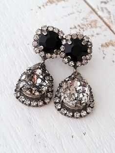 "Black dangle earrings, Black Chandelier earrings, Bridal earrings, Bridesmaids gift, Drop earrings, European crystal earring,Gold or silver Lovely and chic. These earrings would be great for bridal earrings or with evening dress. Perfect gift for bridesmaids or any available other occasion. They are made of oxidized silver plate over brass posts and Swarovski crystals, all set in prong setting. Made with CRYSTALLIZED™ - high quality genuine European (Austrian) crystals Earrings are 34 mm long x Black Dangle Earrings, Black Drop Earrings, Black Earrings Dangle, Night Court, Swarovski Crystal Earrings, Black Chandelier, Wedding Jewelry Earrings, Swarovski Earrings, Earrings Black