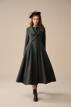 Ready for a little comfy chic? Indulge in a blend of timeless style and luxurious comfort in this single-breasted wool coat. The coat is made of high-quality 100% pure Australian wool, with a soft and natural luster on the cloth surface and good comfort and warmth. The coat's impeccable tailoring and wide lapel collar combine to sculpt a sophisticated and powerful look that will make you stand out from the crowd. It's oversized and maxi-length designed which provides you full-body warmth while n Elegant A-line Single Breasted Outerwear, Elegant A-line Outerwear With Button Closure, Elegant A-line Outerwear With Buttons, Elegant Fitted A-line Wool Coat, Chic A-line Wool Coat For Work, Elegant A-line Wool Coat, Elegant Tailored Wool Coat With Pockets, Elegant Long Wool Coat With Double Button Closure, Formal A-line Wool Coat For Fall