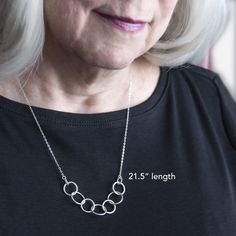 Her 70th birthday is an amazing milestone! Commemorate the occasion by gifting her this timeless necklace. Subtle and elegant, the Anita features seven thick silver circles which interlock as a representation of her seven decades of life. Anita is made of 925 Sterling Silver and measures approximately 20.5" - this length works on practically anyone. If the length is not perfect, we will adjust it for free. Modern Necklaces For Mother's Day Anniversary, Modern Necklace For Anniversary On Mother's Day, Classic Hypoallergenic Necklace For Anniversary, Classic Hypoallergenic Necklaces For Anniversary, Anniversary Hypoallergenic Round Pendant Necklace, Hypoallergenic Round Pendant Necklace For Anniversary, Nickel Free Necklace For Anniversary, Nickel-free Necklace For Anniversary, Nickel-free Round Necklace For Anniversary