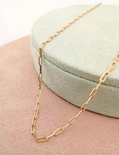 High quality paperclip necklace chain for everyday use. This minimalist design is hand-crafted with love and passion. * Free Express International Shipping NEXT BUSINESS DAY SHIPPING! PRODUCT DETAILS * The product is made of 100% 14k Solid Gold and it has a 14K or 585 stamp on item. (We don't sell filled or plated jewelry) * The package includes a gold certificate. * Every package comes in a gift box. * 14K gold indicates that the product is produced from 58% pure gold. * Chain thickness: 1.50 mm /0,059 inches(front look)  * Chain length: 40, 45, 50 cm/ 16, 18, 20 inches * Chain weight: 2.98 Gram for 20 inches * The product is yellow gold. Follow on Instagram - @pirlant My Web Site - https://www.pirlant.com.tr/ ORDER PROCESS * Available length: 50cm which fits most but if you need longer o Minimalist Paperclip Chain Necklace As Gift, Minimalist Paperclip Chain Necklace For Gift, Minimalist Paperclip Chain Necklace Gift, Minimalist Paperclip Necklace As Gift, Minimalist Paperclip Necklace For Gift, Paperclip Necklace With Delicate Chain For Gift, Paperclip Chain Necklace As A Gift, Dainty Paperclip Chain Necklace For Gift, Delicate Chain Paperclip Bracelet As Gift