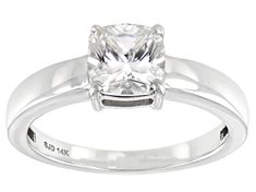 Moissanite Fire(R) 1.30ct diamond equivalent weight cushion cut 14k white gold ring. Measures 3/16" L x 1/16" W. Actual moissanite weight is 1.21ct. Comes with certificate of authenticity. White Square Cut Moissanite Ring, White Cushion Cut Ring With Diamond Accents, 14k White Gold Cushion Cut Diamond Ring, White Cushion Cut Diamond Ring With Vvs Clarity, 14k White Gold Cushion Cut Promise Ring, White Diamond Ring In Sterling Silver With Radiant Cut, Cushion Cut White Diamond Ring In 14k White Gold, 14k White Gold Cushion Cut Jewelry, White Sterling Silver Radiant Cut Diamond Ring