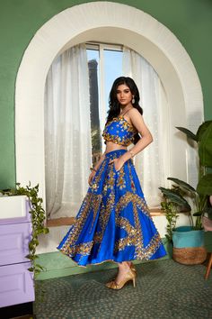 This electric blue colored panelled half lehenga is a work of art, embellished with glass stones, metal pieces, and glass cut beads. The intricate embroidery creates a beautiful shimmering effect that catches the light and sparkles all night long. Night Bling is paired with an original Papa Don't Preach blue blouse, embellished with 3D embroidery.From Papa Don’t Preach’s Capsule collection. DELIVERY TIMEPlease allow 8-12 weeks for your outfit to arrive. FABRIC DETAILSRawsilk Professional cleanin Half Lehenga, Papa Don't Preach, Long Night, 3d Embroidery, Change Image, Intricate Embroidery, 12 Weeks, Capsule Collection, Custom Tailoring