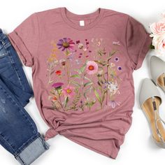 Pink Graphic Tee With Plant Print, Pink Graphic Tee With Plants Print, Pink Crew Neck Top With Plant Print, Pink Floral Print Short Sleeve T-shirt, Pink T-shirt With Plant Print, Short Sleeve, Pink Cotton T-shirt With Plant Print, Floral Embroidered Summer T-shirt, Spring Casual T-shirt With Floral Applique, Pink T-shirt With Plants Print In Relaxed Fit