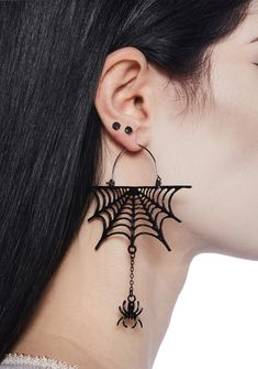 Look spooky in these drop earrings that have web and dangling spider charms. Edgy Pierced Halloween Earrings, Edgy Pierced Earrings For Halloween, Edgy Halloween Pierced Earrings, Edgy Dangle Earrings For Halloween, Edgy Drop Earrings For Halloween, Edgy Halloween Drop Earrings, Black Edgy Dangle Earrings, Edgy Black Dangle Earrings, Black Drop Earrings For Halloween