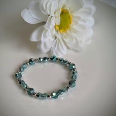 This listing is for a Turquoise Beaded Bracelet Stack. *Two bracelet stackable set *Beads are Faceted allowing it to catch the light and sparkle  *Second bracelet is made of mint seed beads and silver spacer beads *Available in 5, 5 1/2, 6 & 6 1/2 inches long * Beaded with Stretch Cord This bracelet set would be a nice back to school accessory or even a birthday gift for someone special on your list.  **For your convenience I've prepared this bracelet set for you to gift. It will come in a handy Turquoise Crystal Bracelet With Colorful Beads, Turquoise Stretch Bracelet With Round Beads For Gift, Turquoise Stretch Bracelet With Round Beads As Gift, Beaded Turquoise Crystal Bracelet As Gift, Turquoise Beaded Stretch Bangle, Bohemian Turquoise Beaded Hypoallergenic Bracelets, Bohemian Hypoallergenic Turquoise Beaded Bracelets, Turquoise Stretch Bracelet With Colorful Beads As A Gift, Turquoise Faceted Beads Stretch Bracelet As Gift