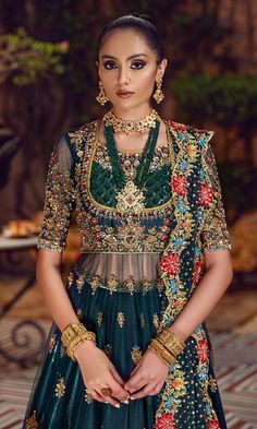 Pakistani Bridal Pishwas Frock Lehenga Dupatta Mehndi Dress is an embellished masterpiece Adorned with shimmering Goldwork and Ornaments. Fast shipping. Red And Green Lehenga, Colourful Lehenga, Bridal Pishwas, Pakistani Mehndi Dress, Mehndi Bridal, Green Lehenga Choli, Nomi Ansari, Heavy Dupatta, Pakistani Bridal Dress