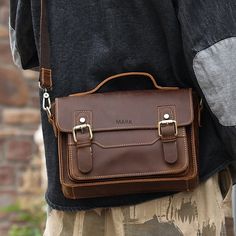 💼Product Description: Introducing our Vintage Cowhide Men's Crossbody Shoulder Messenger Bag, a stylish and practical accessory designed for the modern man. Crafted with genuine leather, this bag exudes a classic charm and is built to withstand the test of time. Whether you're heading to the office or exploring the city, this versatile crossbody bag will effortlessly carry your essentials in style. 💼Highlights: 1.Vintage Design: Inspired by timeless fashion trends, this bag showcases a vintage aesthetic that never goes out of style. The rich cowhide leather adds a touch of sophistication to any outfit. 2.Adjustable Strap: The crossbody strap can be adjusted to your preferred length, ensuring a comfortable and personalized fit. 3.Style and Durability: Made from genuine cowhide leather, th Classic Everyday Carry Mobile Phone Bag, Classic Everyday Mobile Phone Bag, Classic Satchel With Mobile Phone Bag For Business, Classic Business Satchel With Mobile Phone Bag, Everyday Carry Satchel With Mobile Phone Bag, Leather Satchel With Mobile Phone Bag For Everyday Carry, Everyday Leather Satchel With Mobile Phone Bag, Crossbody Bag Men, Vintage Leather Messenger Bag