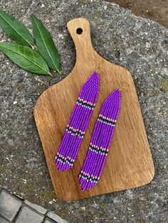 Violet long beaded fringe earrings, purple seed bead earrings dangle boho earrings native beaded earrings chandelier earrings colorful  ♥𝑇ℎ𝑒 𝑝𝑎𝑡𝑡𝑒𝑟𝑛 𝑜𝑓 𝑡ℎ𝑖𝑠 𝑒𝑎𝑟𝑟𝑖𝑛𝑔 𝑖𝑠 𝑐𝑟𝑒𝑎𝑡𝑒𝑑 𝑏𝑦 𝐾𝑎𝑍𝑒𝐵𝑒𝑎𝑑𝐽𝑒𝑤𝑒𝑙𝑟𝑦 ♥𝑀𝑎𝑑𝑒 𝑢𝑠𝑖𝑛𝑔 𝑓𝑟𝑒𝑒ℎ𝑎𝑛𝑑 𝑏𝑒𝑎𝑑𝑖𝑛𝑔 𝑤𝑜𝑣𝑒𝑛 𝑡𝑒𝑐ℎ𝑛𝑖𝑞𝑢𝑒𝑠 𝑤𝑖𝑡ℎ 𝑠𝑡𝑟𝑜𝑛𝑔 𝑠𝑦𝑛𝑡ℎ𝑒𝑡𝑖𝑐 𝑡ℎ𝑟𝑒𝑎𝑑. ♥𝑇ℎ𝑒 𝑠𝑖𝑧𝑒 𝑜𝑓 𝑡ℎ𝑒 𝑠𝑒𝑒𝑑 𝑏𝑒𝑎𝑑𝑠 𝑢𝑠𝑒𝑑 𝑖𝑠 2 𝑚𝑖𝑙𝑙𝑖𝑚𝑒𝑡𝑒𝑟𝑠 𝑎𝑛𝑑 𝑏𝑒𝑎𝑑𝑠 𝑎𝑟𝑒 ℎ𝑖𝑔ℎ 𝑞𝑢𝑎𝑙𝑖𝑓𝑖𝑒𝑑. ♥𝐴𝑙𝑙 𝑡ℎ𝑒 ℎ𝑜𝑜𝑘𝑠 𝑢𝑠𝑒𝑑 𝑖𝑛 𝑜𝑢𝑟 𝑗𝑒𝑤𝑒𝑙𝑟𝑦 𝑎𝑟𝑒 24 𝑘 𝑔𝑜𝑙𝑑 𝑝𝑙𝑎𝑡𝑒𝑑 𝑎𝑛𝑑 ℎ𝑦𝑝𝑜𝑎𝑙𝑙𝑒𝑟𝑔𝑒𝑛𝑖𝑐. ♥𝑇ℎ𝑒𝑠𝑒 𝑎𝑟𝑒 𝑣𝑒𝑟𝑦 𝑙𝑖𝑔ℎ𝑡 𝑒𝑎𝑟𝑟𝑖𝑛𝑔𝑠 𝑡ℎ𝑎𝑡 𝑦𝑜𝑢 𝑐𝑎𝑛 𝑤𝑒𝑎𝑟 𝑎𝑙𝑙 𝑑𝑎𝑦 𝑤𝑖𝑡ℎ𝑜𝑢𝑡 ℎ𝑢𝑟𝑡𝑖𝑛𝑔 𝑦𝑜𝑢𝑟 𝑒𝑎𝑟! The only a Purple Beaded Dangle Earrings For Festival, Purple Fringe Beaded Earrings As Gift, Purple Fringe Beaded Earrings For Gift, Festival Purple Beaded Earrings, Purple Beaded Fringe Drop Earrings, Native Beaded Earrings, Beaded Fringe Earrings, Earrings Chandelier, Earrings Colorful