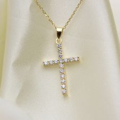 This Gorgeous diamond cross is made with 14 k solid gold and 0.40 ct natural diamonds. the design is made with upmost care to a busy everyday wear. available in all three 14 k gold colors . the diamonds are SI 1 clarity and G color for a sparkle that would last for years to come. the chain is a 1 mm diamond cut cable link chain available in 14 through 20 inches. you can also purchase the cross without the chain if you have your own FREE shipping within the USA. Material: 14 k solid gold available in 14 k yellow gold , 14 k white gold and 14 k rose gold  Diamonds : 16 natural earth mined 0.40 ct  total weight SI 1 clarity G color size : 20 mm height not including the bail thoughtful fine jewelry gift for someone special, this 14k gold diamond necklace is the perfect choice. All of my pieces Gold Diamond Cross Necklace, Diamond Cross Necklace Gold, Diamond Cross Necklace, Gold Colors, Gold Diamond Necklace, Diamond Cross, Cross Design, Fine Jewelry Collection, Fine Jewelry Gift