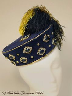 The Mistress Brydges--Navy velvet, gold cord, enameled findings, brass findings, ostrich feathers.  Elizabethan bonnet designed and created by Michelle Fennema 2006. Brimless Hat, Headband Jewelry, History Fashion, Millinery Hats, Navy Velvet, Ostrich Feathers, Clothes Crafts