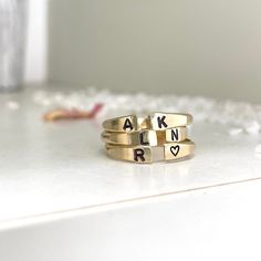 Our Personalized Open Cuff Ring might be small but it makes a mighty statement. This gorgeous minimalist style ring is perfect for stacking two, three, even four or layering with other ring styles. The fact that you can personalize it with initials and other designs just make it even better or leave it blank, it's totally up to you. Besides initials, this piece can be personalized with numbers, hearts, stars,s or flower symbols. This ring is hand-made and stamped in our studio at the time of order, of heavy 10 gauge 14kt gold filled metal wire. It's about 2mm thick and has an organic shape that is created by working the metal. This ring is 100% 14kt gold-filled, it is very durable and will wear very well with appropriate care, it will not change color or discolor your skin. I promise you'r Adjustable Stackable Initial Open Ring, Classic Adjustable Stackable Rings With Initials, Minimalist Stackable Initial Ring For Anniversary, Modern Adjustable Initial Ring With Open Design, Modern Adjustable Initial Open Ring, Adjustable Stackable Initial Ring, Adjustable Stackable Initial Ring For Everyday, Everyday Open Ring With Initials, Modern Stackable Initial Ring For Anniversary