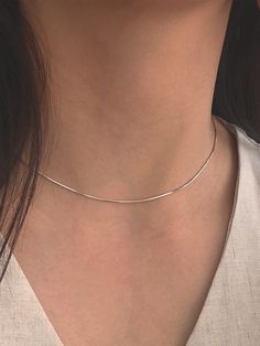 Editor's Notesbyweekend presents an essential snake chain necklace with silky smooth gloss. It is a simple yet, feminine item that stands out. - Snake chain- Silky smooth gloss- Made of silver 925- 18K gold plated- Sleek silhouette- Simple and basic style Measurements(in.)One Size- Size: 14.96 in. ( + 1.97 in. ) Composition & Care- Material: Silver 925, 18K Gold Plating- Plated products may discolor over time due to their nature.- Please be careful that discoloration may proceed faster in chemical substances, water, and heat.- As all jewelry products are vulnerable to discoloration, we recommend you gently wipe them with a dry cloth and store them in an airtight zipper bag when not wearing them Designer- by byweekend Daily Wear Neck Chain, Simple Chain Necklace Silver, Short Chain Necklace, Ring Chain Necklace, Stackable Necklaces Silver, Minimal Silver Necklace, Silver Snake Chain Necklace With Delicate Chain For Everyday, Dainty Silver Snake Chain Necklace With Delicate Chain, Dainty Silver Snake Chain Necklace With Delicate Details