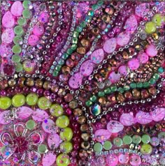 an art work made with buttons and beads