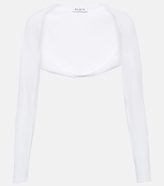 Knit Shrug in White - Alaia | Mytheresa Fitted Cropped Shrug For Layering, Elegant Fitted Ribbed Crop Top, White Evening Crop Top, Elegant Ribbed Cropped Crop Top, Elegant White Stretch Crop Top, Elegant White Open Front Top, White Stretch Open Front Top, Chic Cropped Shrug For Layering, White Chic Fitted Shrug