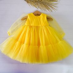 "Perfect first birthday dress for a little Princess! This beautiful dress is suitable for baby girls, kids and toddlers! Perfect outfit for formal events, as flower dress, birthday party and fairy photo shoot. The dress is made of yellow tulle and has long sleeves. The bodice is decorated with elegant tulle draping. This dress is very lightweight and fluffy. The tulle is soft and not itchy, it is very comfortable for kid's skin. We make dresses in standard sizes and by individual measurements. I Fairy Photo Shoot, Tulle Draping, Tulle Dress Long Sleeve, Yellow Baby Dress, Yellow Flower Girl Dresses, Frocks For Babies, Tulle Dress Long, Princess Outfit