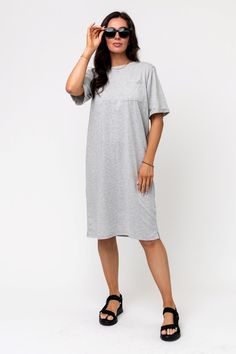 Lilo Dress in Grey (Small-XL) Holley Girl Gray Oversized Short Sleeve Dresses, Casual Oversized Dress With Curved Hem, Casual Crew Neck Dress With Pockets, Oversized Casual T-shirt Dress For Summer, Spring Solid Color Relaxed Fit T-shirt Dress, Oversized Cotton T-shirt Dress For Loungewear, Oversized T-shirt Dress For Spring Loungewear, Relaxed Fit Midi T-shirt Dress For Spring, Casual Oversized T-shirt Dress For Daywear