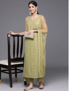 *Women Ethnic Motifs Embroidered Regular Sequinned Kurta with Trousers & With Dupatta Pakistani Salwar Kameez / Indian Wedding Dress / Plus Size Cotton Dress Traditional Indian Wear / Salwar Kameez Dupatta / Kurti Palazzo Set / Hand Embroidery kurta Olive green embroidered Kurta with Trousers with dupatta *Kurta design:-  *  Ethnic motifs embroidered   *  Straight shape   *  Regular style   *  V-neck, sleeveless no sleeves   *  2 pockets sequinned detail   *  Calf length length with straight hem Sleeveless Salwar Kameez For Party, Traditional Sleeveless Georgette Dress, Elegant Sleeveless Kurta With Dupatta, Elegant Sleeveless Georgette Traditional Wear, Sleeveless Georgette Salwar Kameez For Navratri, Sleeveless Georgette Traditional Wear For Eid, Sleeveless Salwar Kameez With Resham Embroidery, Festive Sleeveless Georgette Salwar Kameez, Sleeveless Georgette Salwar Kameez For Festivals