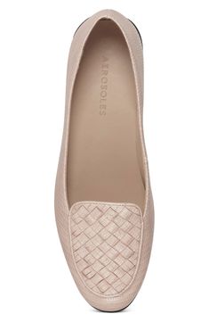 Inspired by an iconic Venetian loafer silhouette, the Brielle conveys an elegant, streamlined aesthetic. Woven embellishment complements the look with a refined textured effect. Stitch 'N Turn technology assures an endlessly flexible, comfortable fit. 3/4" Heel Height. Synthetic Upper, Balance Synthetic Materials.Sizing: True to size. M=standard width. - Apron toe- Slip-on - Lightly padded footbed- Approx. 0.75" heel- ImportedThis item cannot be shipped to Canada. Faux leather upper, manmade sol Chic Synthetic Slip-ons For Work, Chic Synthetic Flat Slip-ons, Elegant Synthetic Slip-ons For Office, Modern Slip-ons For Office, Office Slip-on Synthetic Loafers, Elegant Slip-ons With Woven Sole And Round Toe, Spring Synthetic Slip-ons For Business Casual, Spring Synthetic Loafers For Business Casual, Elegant Slip-ons For Office In Spring