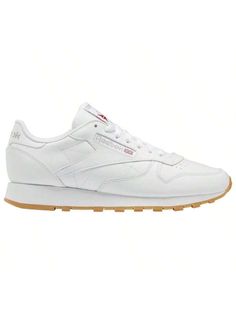 Blending high fashion and street style, the Reebok Classic Leather N/Core pays homage to iconic Reebok heritage. Boasting a soft leather upper that adds a refined look, these shoes also feature an EVA midsole for an incredible bounce with every step. The high-abrasion rubber outsole delivers the grippiest stride and returns confidence with each step. Celebrate clean and classic style in the Reebok Classic Leather N/Core.  Classic lace-up design delivers the perfect fit. High-cushion molded sockl Reebok Classic Leather, Reebok Classic, Outdoor Shoes, Classic Leather, White Collar, White White, Running Shoes For Men, Sports Equipment, Soft Leather