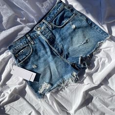 Boyish Jeans Shorts, New With Tags In The Style Cody In Authentic Rigid, High-Rise Cut Off Short, Color Is Top-Five Model Pictures Are Of The Same Cut In A Similar Wash (Anthropologie Sells This Brand) #Boyish #Boyishdenim #Boyishjeans #Denimshorts #Summer22 Cheap Blue Zara Jean Shorts, Summer Denim Cutoff Pants, Summer Cutoff Denim Pants, High Waist Pants With Frayed Hem For Summer, Summer High Waist Pants With Frayed Hem, Medium Wash Short Pants For Summer, Blue Pants With Frayed Hem For Summer, Blue Summer Pants With Frayed Hem, Blue Cutoff Pants For Spring