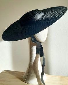 Wide Brimmed Black Straw Boater Hat - Etsy Chic Brimmed Boater Hat In Toquilla Straw, Elegant Brimmed Boater Hat In Toquilla Straw, Adjustable Black Boater Hat With Flat Crown, Black Adjustable Boater Hat With Flat Crown, Elegant Woven Brimmed Straw Hat, Elegant Panama Hat With Flat Crown For Beach, Elegant Straw Hat With Flat Crown For Vacation, Elegant Adjustable Woven Hat Bands, Elegant Beach Panama Hat With Flat Crown