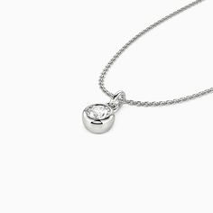 This solitaire necklace features a brilliant round-cut stone set in a highly polished bezel setting, adding dimension to the center stone with a chic appeal. Its timeless design permits it to match any casual or formal attire, and you can customize the stone you prefer.Carat Weight: 0.3 ctStone Size: 4 mmStone Type: Moissanite/GemstoneNumber of Stones: 1 Stone Color: OptionalStone Shape: RoundChain Type: O-chainWidth: 4.8 mmHeight: 6.8 mmThickness: 2.8 mmMaterial: 10K/14K/18K Solid Gold , Platin Modern Necklace With Single Round-cut Diamond, Modern Necklace With Single Round Cut Diamond, Modern Single Diamond Round Cut Necklace, Modern Round Diamond Necklace, Modern Necklace With Single Diamond And Round Pendant, Modern Necklace With Single Diamond In Round Pendant, Modern Necklace With Single Diamond On Round Pendant, Elegant Polished Birthstone Necklace, White Gold Necklace With Bezel Setting And Round Cut