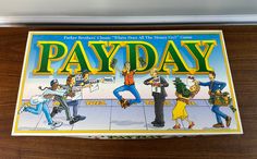 the front cover of payday magazine on a wooden table with people dancing around it