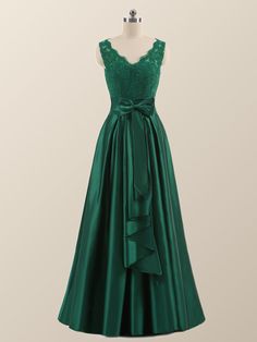 The elegant green A-line long formal dress starts with a v-neck lace top and a satin full-length skirt. Elegant Green A-line Gown, Elegant Green A-line Evening Dress, Green Lace Ball Gown For Prom, Green Lace Ball Gown For Prom Season, Green A-line Evening Dress For Gala, Green Satin Ball Gown For Prom, Satin V-neck Dress With Lace Bodice, Green Satin Ball Gown For Party, Green Ball Gown Evening Dress For Formal Occasions